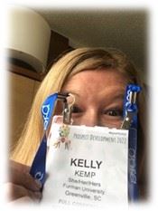 Kelly Kemp with a badge